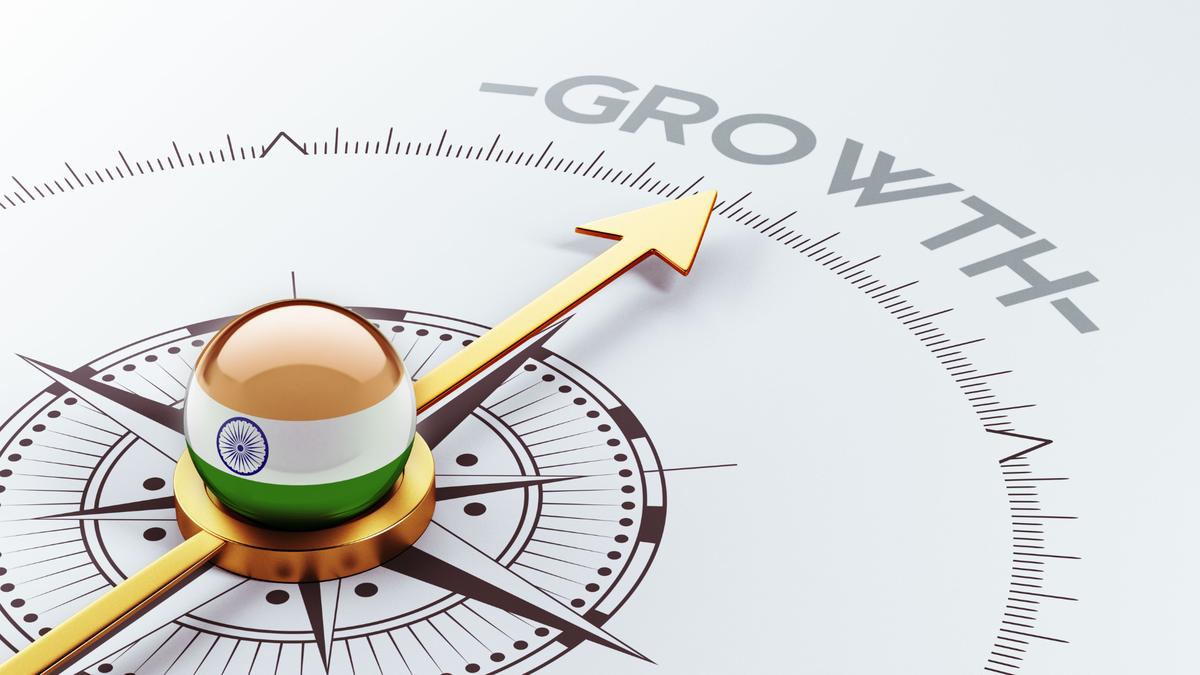 Compass with the Indian flag pointing toward growth, symbolizing statutory compliance automation